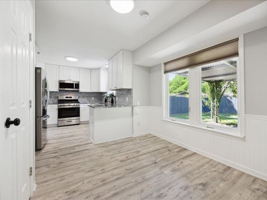 Interior, Kitchen, Recessed Lighting, Stainless Steel Appliances, Wood Texture Flooring