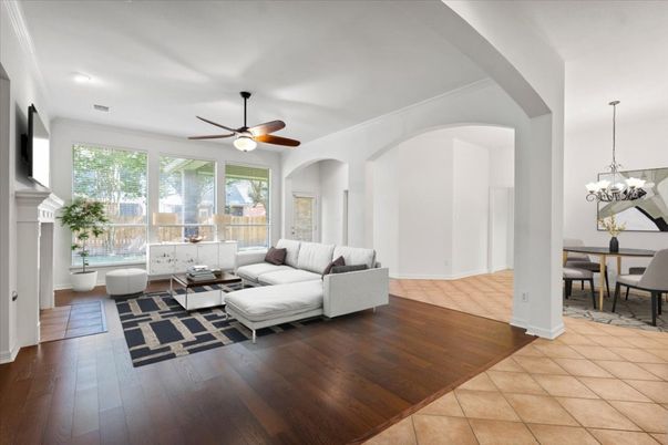 Chandelier, Dining room, Fireplace, Interior, Living room, Recessed Lighting, Wood Texture Flooring