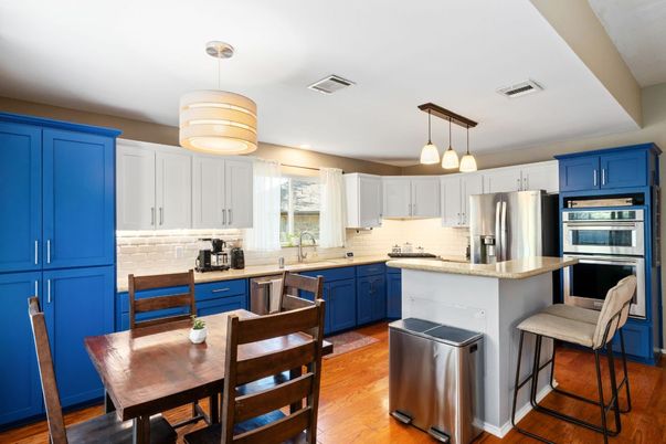 Dining room, Interior, Kitchen, Pendant Lights, Stainless Steel Appliances, Wood Texture Flooring