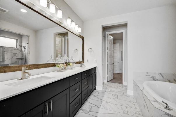 Bathroom, Dual Sink Vanities, Interior, Marble, Recessed Lighting, Walk-in Closets