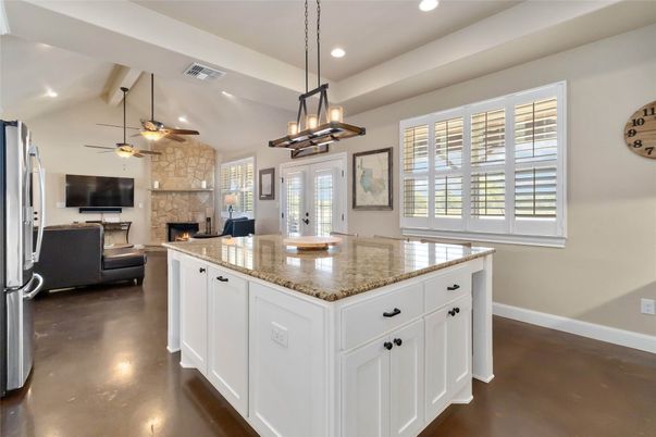 Fireplace, Interior, Kitchen, Living room, Pendant Lights, Recessed Lighting, Stone Walls, Wood Texture Flooring