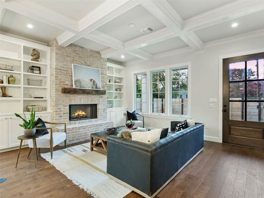 Fireplace, Interior, Living room, Recessed Lighting, Stone Walls, Wood Texture Flooring