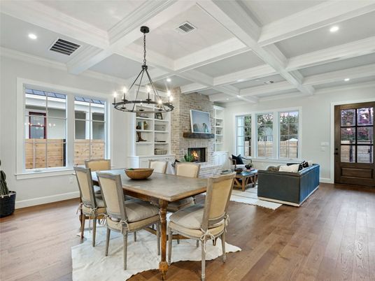Chandelier, Dining room, Fireplace, Interior, Living room, Recessed Lighting, Stone Walls, Wood Texture Flooring