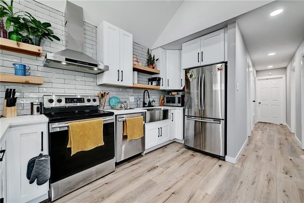 Interior, Kitchen, Recessed Lighting, Stainless Steel Appliances, Wood Texture Flooring