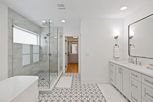 Bathroom, Dual Sink Vanities, Free Standing Baths, Glass Shower, Interior, Marble Walls, Recessed Lighting