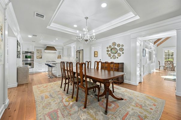 Chandelier, Dining room, Interior, Kitchen, Recessed Lighting, Stainless Steel Appliances, Wood Texture Flooring