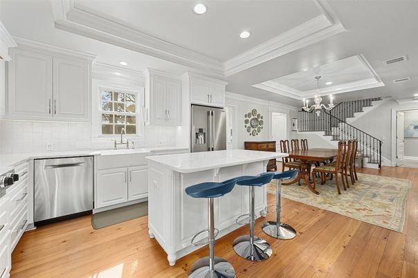 Chandelier, Dining room, Interior, Kitchen, Recessed Lighting, Stainless Steel Appliances, Wood Texture Flooring