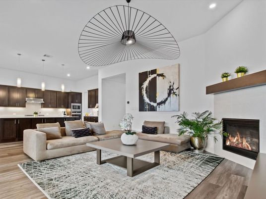 Fireplace, Interior, Kitchen, Living room, Pendant Lights, Recessed Lighting, Stainless Steel Appliances, Wood Texture Flooring