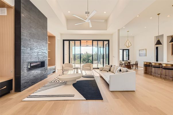 Dining room, Fireplace, Interior, Living room, Pendant Lights, Recessed Lighting, Wood Texture Flooring