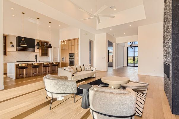 Interior, Kitchen, Living room, Marble Walls, Pendant Lights, Recessed Lighting, Stainless Steel Appliances, Wood Texture Flooring