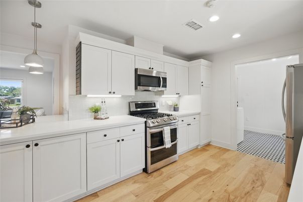 Interior, Kitchen, Pendant Lights, Recessed Lighting, Stainless Steel Appliances, Wood Texture Flooring