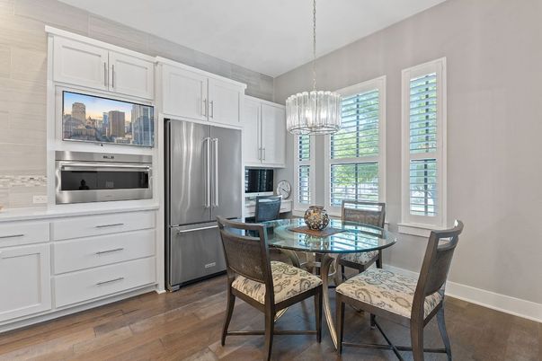 Chandelier, Dining room, Interior, Kitchen, Pendant Lights, Stainless Steel Appliances, Wood Texture Flooring