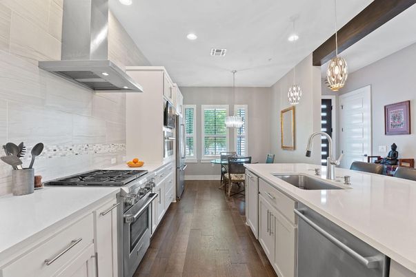 Dining room, Interior, Kitchen, Pendant Lights, Recessed Lighting, Stainless Steel Appliances, Wood Texture Flooring