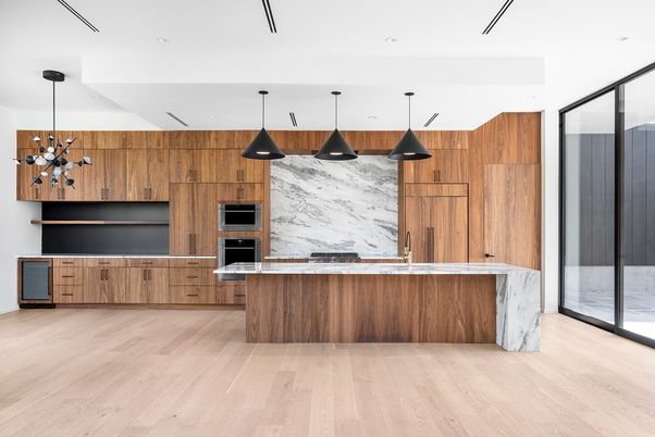 Interior, Kitchen, Marble Walls, Pendant Lights, Recessed Lighting, Stainless Steel Appliances, Wood Texture Flooring
