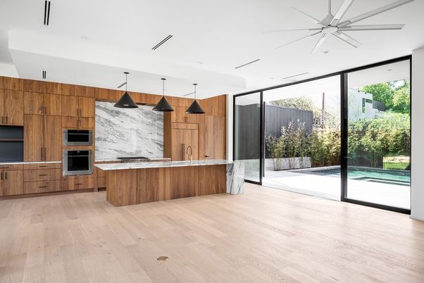 Interior, Kitchen, Marble Walls, Pendant Lights, Recessed Lighting, Stainless Steel Appliances, Wood Texture Flooring