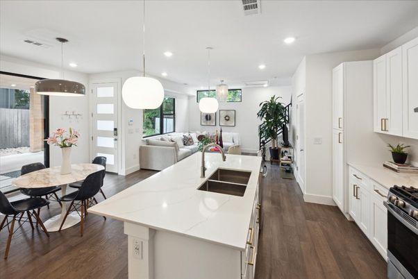 Dining room, Interior, Kitchen, Living room, Pendant Lights, Recessed Lighting, Stainless Steel Appliances, Wood Texture Flooring