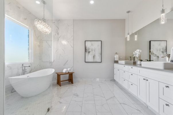 Bathroom, Dual Sink Vanities, Free Standing Baths, Interior, Marble, Marble Walls, Pendant Lights, Recessed Lighting