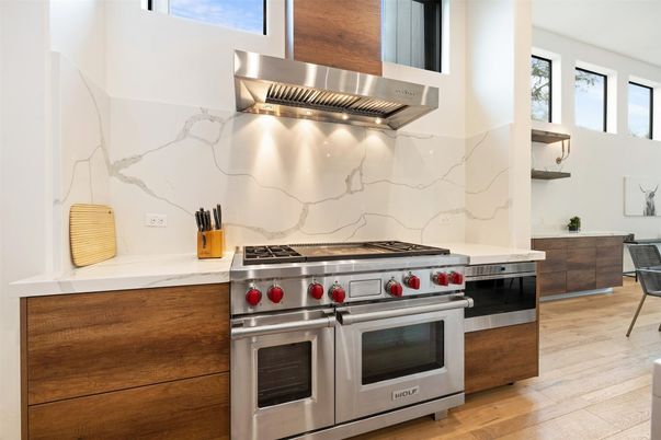 Interior, Kitchen, Marble Walls, Stainless Steel Appliances, Wood Texture Flooring