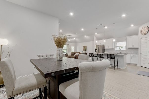 Dining room, Interior, Kitchen, Pendant Lights, Recessed Lighting, Stainless Steel Appliances, Wood Texture Flooring