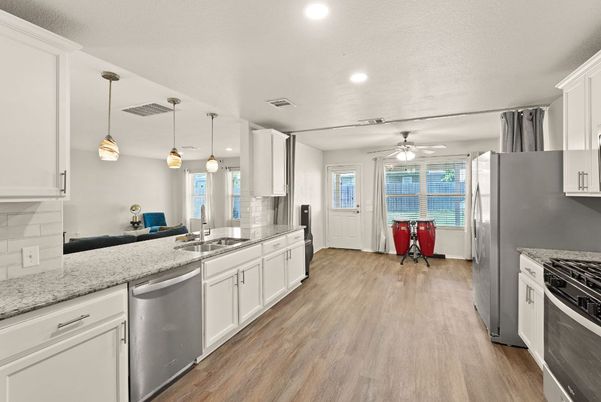 Interior, Kitchen, Pendant Lights, Recessed Lighting, Stainless Steel Appliances, Wood Texture Flooring