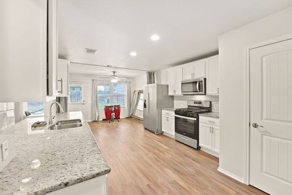 Dining room, Interior, Kitchen, Recessed Lighting, Stainless Steel Appliances, Wood Texture Flooring