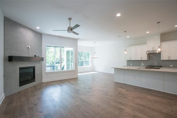 Empty room, Fireplace, Interior, Kitchen, Pendant Lights, Recessed Lighting, Wood Texture Flooring