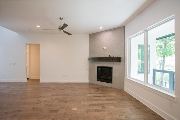 Empty room, Fireplace, Interior, Recessed Lighting, Wood Texture Flooring