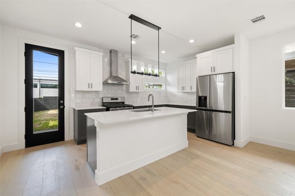 Interior, Kitchen, Pendant Lights, Recessed Lighting, Stainless Steel Appliances, Wood Texture Flooring