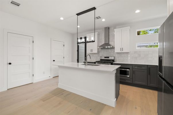 Interior, Kitchen, Pendant Lights, Recessed Lighting, Stainless Steel Appliances, Wood Texture Flooring