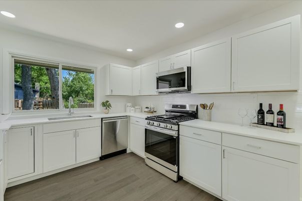 Interior, Kitchen, Recessed Lighting, Stainless Steel Appliances, Wood Texture Flooring