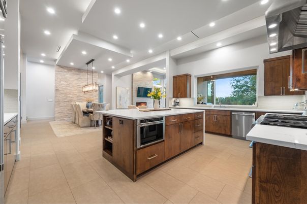Dining room, Fireplace, Interior, Kitchen, Pendant Lights, Recessed Lighting, Stainless Steel Appliances, Stone Walls