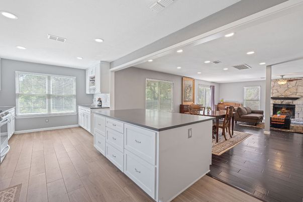 Dining room, Fireplace, Interior, Kitchen, Living room, Recessed Lighting, Wood Texture Flooring