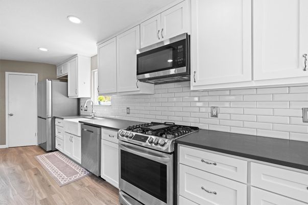 Interior, Kitchen, Recessed Lighting, Stainless Steel Appliances, Wood Texture Flooring