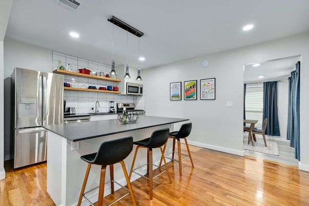Interior, Kitchen, Pendant Lights, Recessed Lighting, Stainless Steel Appliances, Wood Texture Flooring