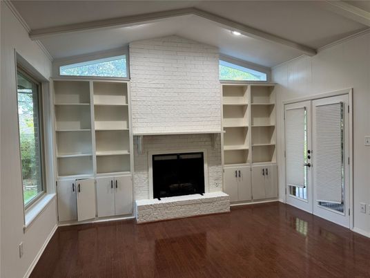 Empty room, Fireplace, Interior, Recessed Lighting, Stone Walls, Wood Texture Flooring