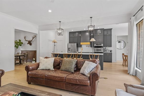 Dining room, Interior, Kitchen, Living room, Pendant Lights, Recessed Lighting, Stainless Steel Appliances, Wood Texture Flooring