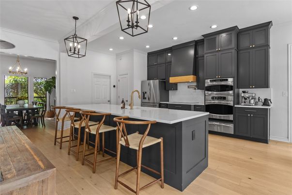 Dining room, Interior, Kitchen, Pendant Lights, Recessed Lighting, Stainless Steel Appliances, Wood Texture Flooring