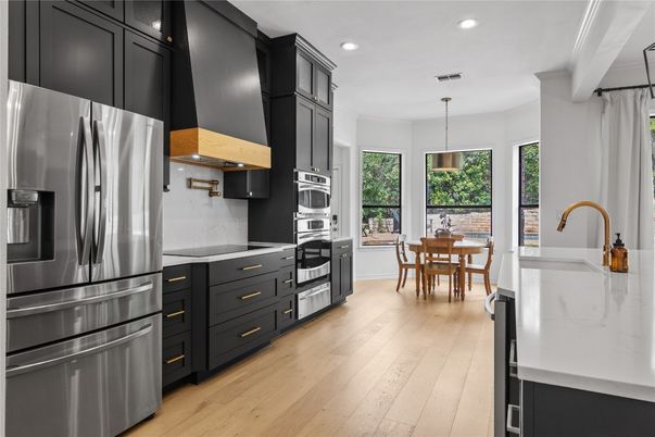 Dining room, Interior, Kitchen, Pendant Lights, Recessed Lighting, Stainless Steel Appliances, Wood Texture Flooring