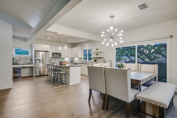 Dining room, Interior, Kitchen, Pendant Lights, Recessed Lighting, Stainless Steel Appliances, Wood Texture Flooring