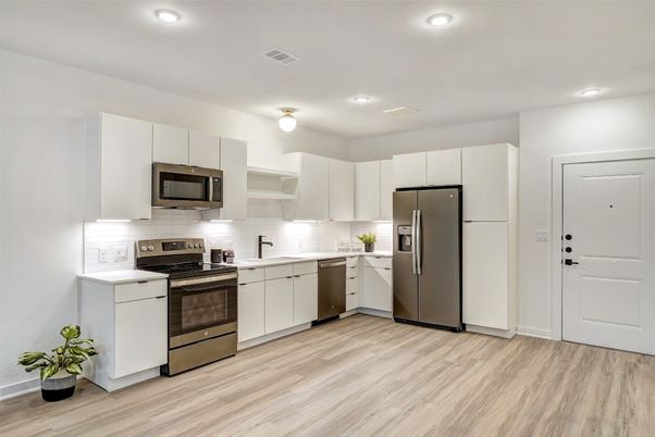 Interior, Kitchen, Recessed Lighting, Stainless Steel Appliances, Wood Texture Flooring