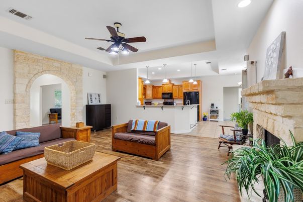 Fireplace, Interior, Kitchen, Living room, Pendant Lights, Recessed Lighting, Stone Walls, Wood Texture Flooring