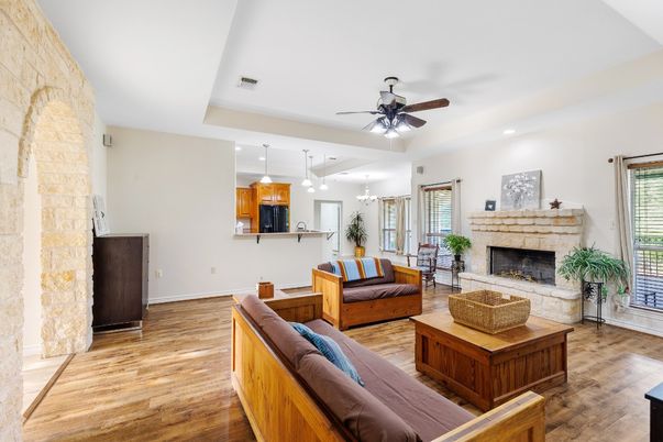 Fireplace, Interior, Kitchen, Living room, Pendant Lights, Recessed Lighting, Stone Walls, Wood Texture Flooring