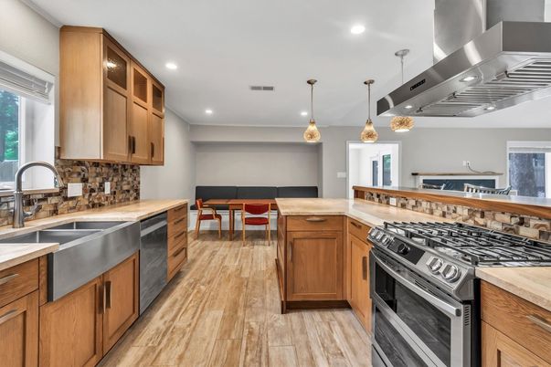 Dining room, Interior, Kitchen, Pendant Lights, Recessed Lighting, Stainless Steel Appliances, Wood Texture Flooring