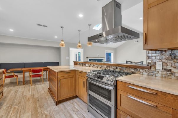 Dining room, Interior, Kitchen, Pendant Lights, Recessed Lighting, Stainless Steel Appliances, Wood Texture Flooring