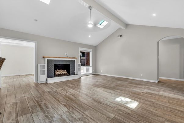 Empty room, Fireplace, Interior, Pendant Lights, Recessed Lighting, Wood Texture Flooring