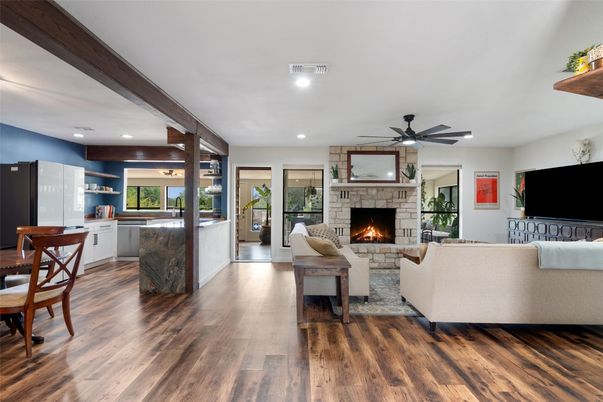 Dining room, Fireplace, Interior, Living room, Recessed Lighting, Wood Texture Flooring