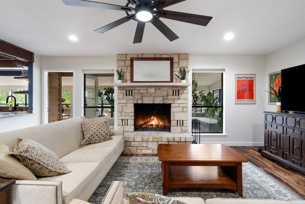 Fireplace, Interior, Living room, Recessed Lighting, Stone Walls, Wood Texture Flooring