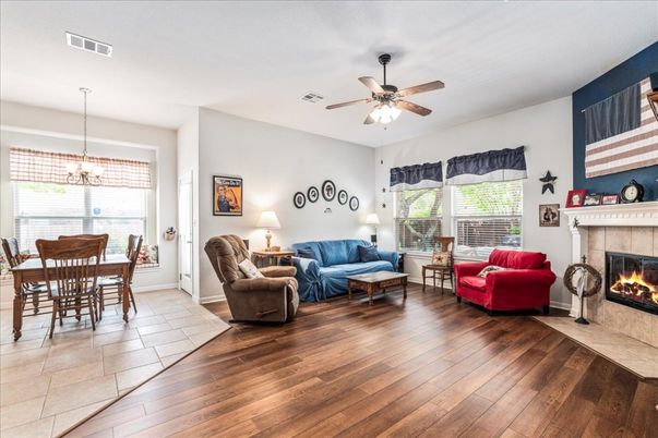 Chandelier, Dining room, Fireplace, Interior, Living room, Pendant Lights, Wood Texture Flooring
