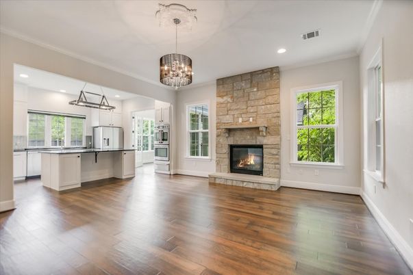 Chandelier, Empty room, Fireplace, Interior, Kitchen, Pendant Lights, Recessed Lighting, Wood Texture Flooring