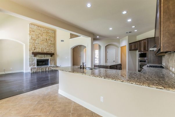Fireplace, Interior, Kitchen, Recessed Lighting, Wood Texture Flooring